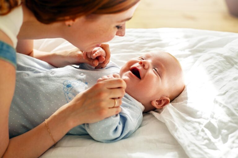 Happy,Young,Mother,Bonding,With,Her,Toddler,Son,In,Blue