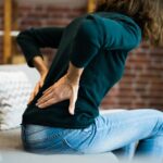 Woman With Back Pain And Ache