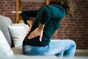 Woman With Back Pain And Ache
