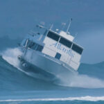 jamie-o-brien-chronicles-historic-boat-floater-amid-high-surf-in-honolulu