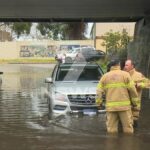 Cars stuck in flooded tunnel in Claremont