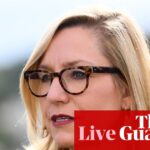 australia-faces-controversy-over-ev-tax-and-major-job-cuts-at-anz