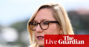 australia-faces-controversy-over-ev-tax-and-major-job-cuts-at-anz