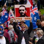 controversial-placard-at-adelaide-rally-sparks-outrage-and-investigation