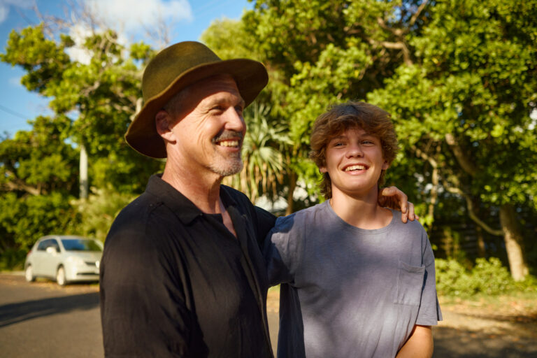 Father and son sharing a moment of affection in australia