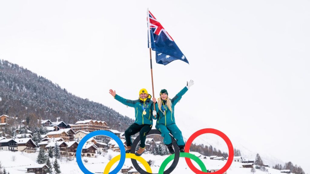 australian-olympic-heroes-honored-as-flag-bearers-amid-historic-winter-games